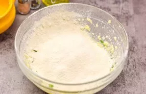 Mix everything and sift the wheat flour with baking powder.