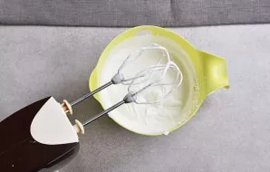 Whip the cream.