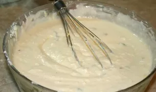 Now add the whipped proteins and yolks. Stir.