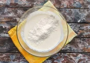 Add the sifted flour and mix well.