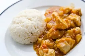 Our dish is served with rice. Enjoy your meal!