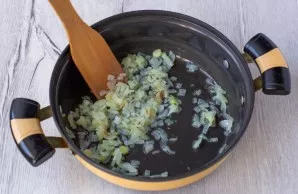 Finely chop the onion and fry until transparent.