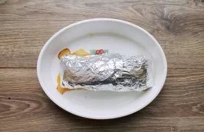 Roll the fillet into a roll, being careful not to damage the meat. Wrap in foil and place in a baking dish. add 50 milliliters of water a...