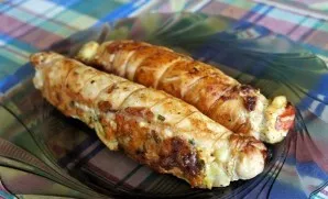 Then transfer to a baking sheet and place in the oven. Bake at a temperature of 180 degrees for about 20 minutes until browned. After tha...