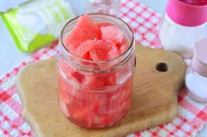 Put the watermelon in jars with all the juice.