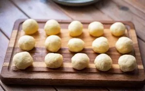 Roll out balls the size of a small walnut from the whole potato dough.