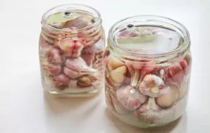 Fill each jar to the top with cold, unboiled water and close the lids. Leave at room temperature for one day.