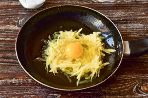 Sprinkle the egg with salt and pepper.