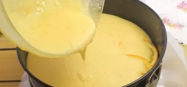 Now carefully, so as not to move the laid oranges, fill them with dough, level them - and you can put the cake in the oven, preheated to ...