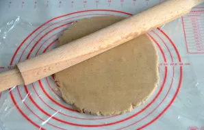 Roll out the dough into a layer 0.8-1 cm thick, it is best to do this between two layers of cling film.