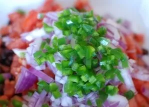 Put finely chopped jalapeno pepper there.