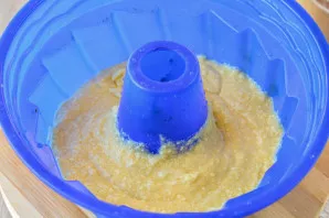 The dough should get not very thick, pour into a baking sheet and bake in a preheated oven at 180-190 degrees.