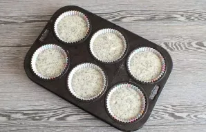 Grease the baking tray with a thin layer of vegetable oil or place paper cupcake molds. Pour the batter. Place the mold in the oven, heat...