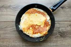 Turn the eggs over very carefully.