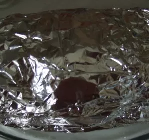 We wrap the piece of meat in foil and place it in the oven heated to 190 degrees. We bake for an hour and a half, depending on your oven ...