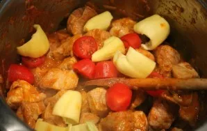 Add coarsely chopped tomato and bell pepper.