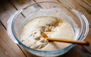 After 30 minutes, the dough noticeably increased in size and acquired a porous structure.