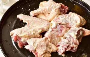 Spread each piece well with mayonnaise. Send the meat to the oven heated to 190 degrees for 1 hour.