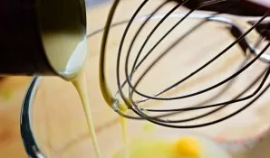 Pour in condensed milk and beat until smooth.