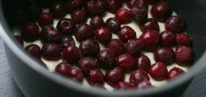 Put cherries on top. Frozen berries can be added immediately, defrosting is not necessary. Due to the rather thick texture of the dough, ...