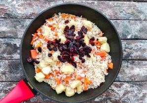 Add raisins and simmer for another 5 minutes.