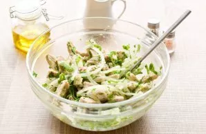 Season the salad with oil and mix. Serve the salad to the table.