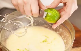 Grate the zest of one lemon.