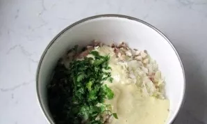 Put in a chopped turkey. Add salt, pepper and chopped herbs to taste.