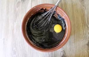 Add the eggs to the dough and mix.