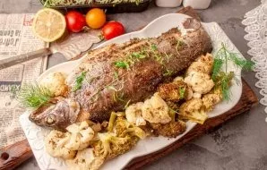 Transfer the prepared vegetables and fish to a container, serve hot. Delicious!