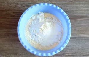 Add flour, baking powder. Mix well.