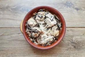 Mix chicken and mushrooms, put in a baking dish. Cover the container with baking foil and bake in the oven for 40 minutes at a temperatur...