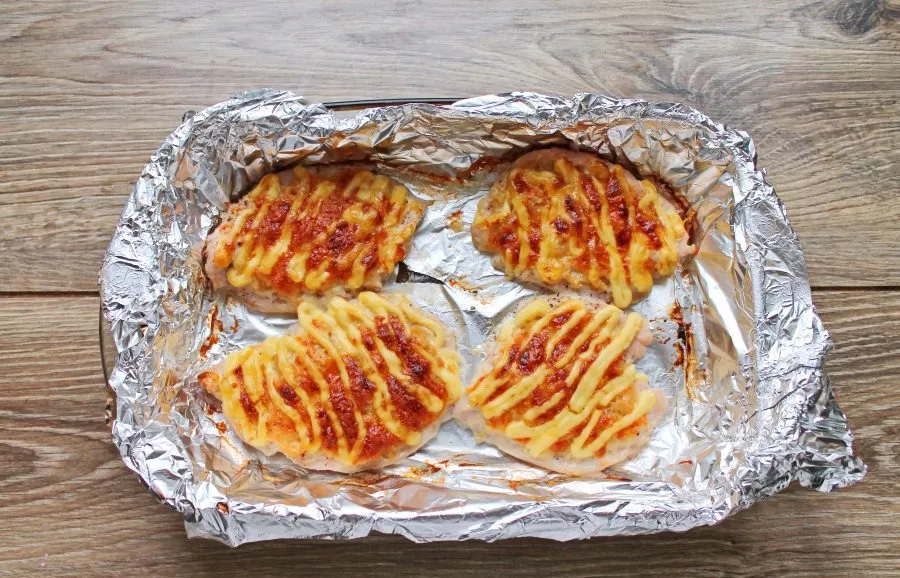 Pour some water into the baking dish and put it in a hot oven. Bake the chicken breast in an oven heated to 180 degrees for 35 minutes un...