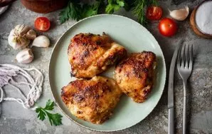 Ready chicken thighs can be immediately served hot.