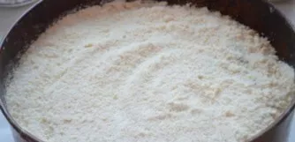 Spread the remaining butter crumbs on top of the baking sheet. Then preheat the oven to one hundred and eighty degrees and put a cake in ...