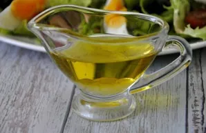 Prepare a salad dressing from olive oil and lemon juice, add a little granulated sugar to balance the taste, I do not recommend salting.