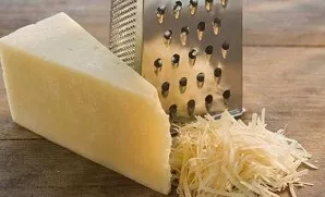 Grate the cheese on a coarse grater.