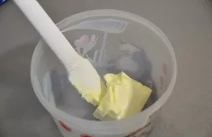 Put the soft butter in the blender bowl.