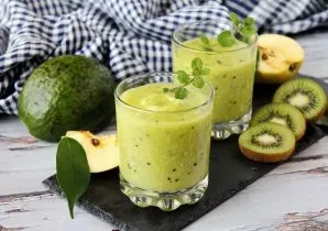 Avocado, kiwi and celery cocktail with apple juice is ready!