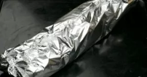 Wrap the baguette in foil.