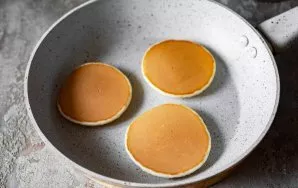 Then turn the pancakes to the other side and bake for another 2 minutes until cooked.