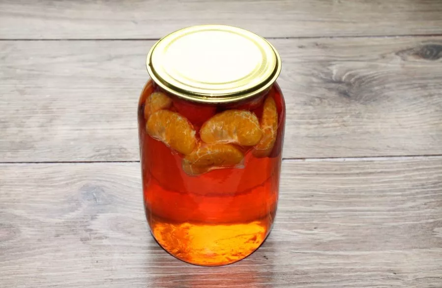 Pour the boiling syrup back into the jar and immediately close the boiled lid.