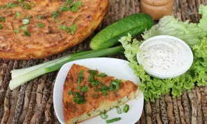 The potato and cottage cheese casserole is ready. Enjoy your meal!