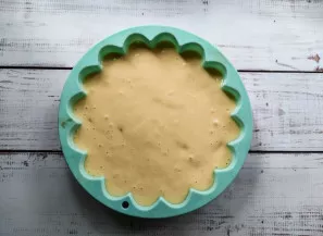 Grease the baking dish with butter, pour the dough into it and send it to the oven heated to 180 degrees for 30 minutes.