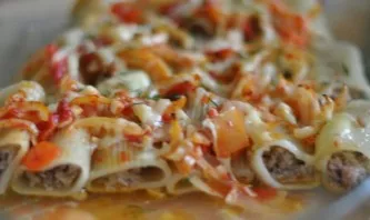 Grate the remaining cheese on top of the vegetables. Pour half a glass of water. Bake in the oven for 15 minutes at a temperature of 200 ...