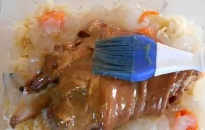 Pour in the broth in which the karka boiled, put the carcass on the cabbage, grease with mustard and honey. We send to the oven, preheate...