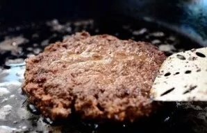 Turn over and fry on the other side until cooked.