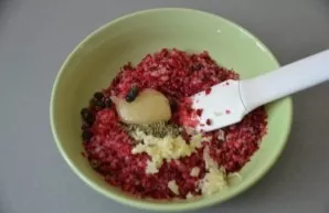 Add juniper berries to the marinade, squeeze garlic there.