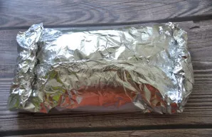 Wrap the ham with foil and tightly close the seams. Put in the refrigerator for several hours so that the meat marinates, then bake at a ...