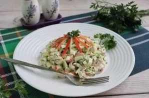 Salad with crab sticks, onions and herbs is ready. Delicious!